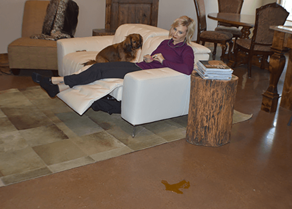 woman with dog on clean white sofa/recliner